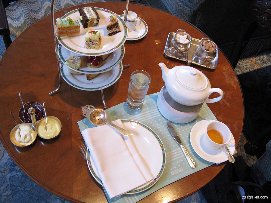Table setting for afternoon tea at Ritz Carlton Chicago Hotel with three tier tray